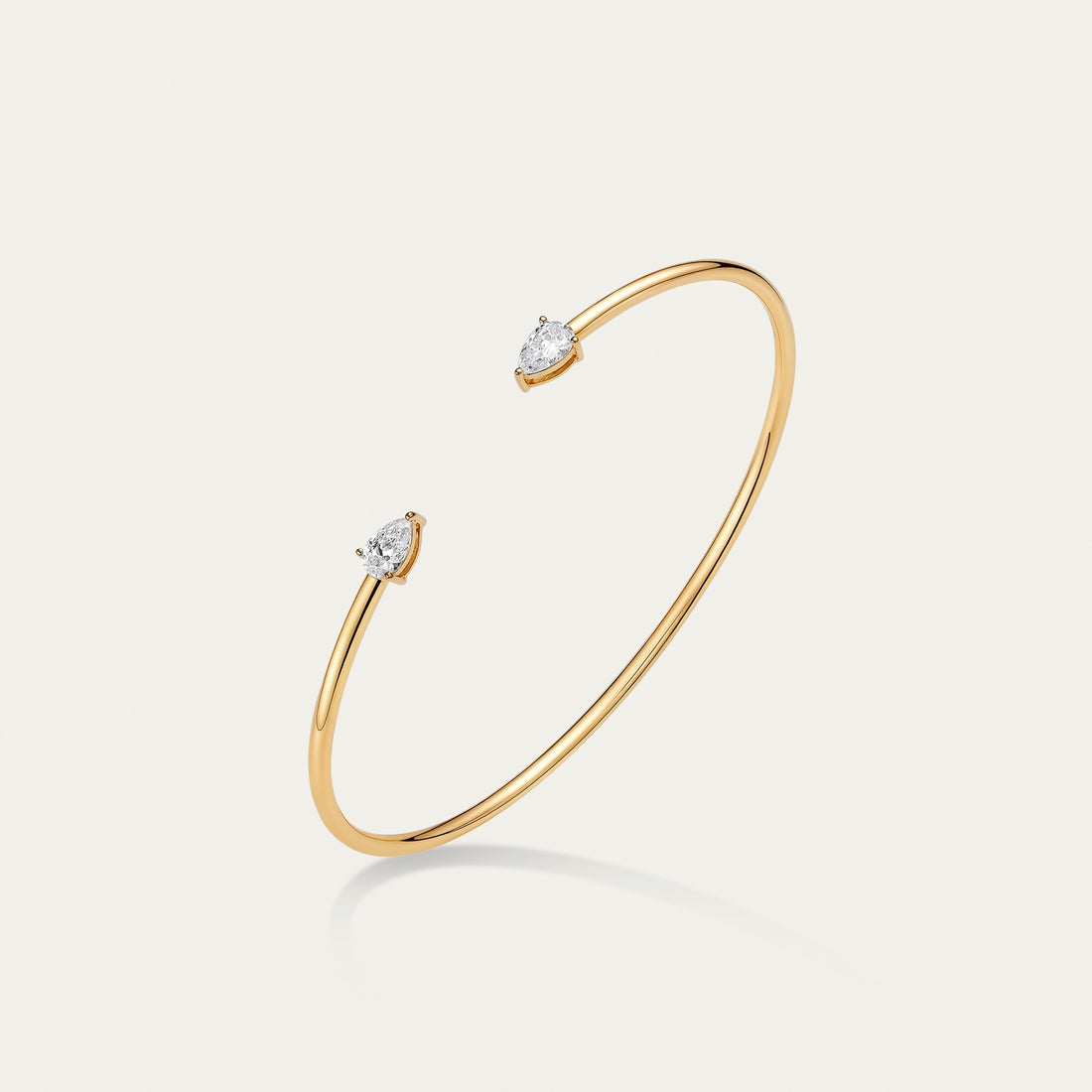 Briolette (teardrop) lab-grown diamond bangle in 18k yellow gold — 0.62ct, D-F color, VS-VVS clarity, additional view