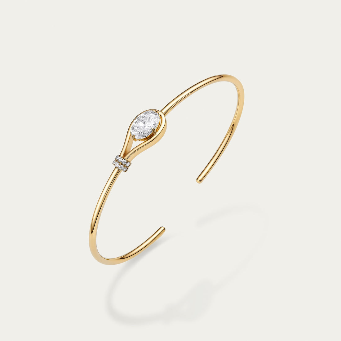 Oval cut lab-grown diamond bangle in 18k yellow gold — 1.21ct, D-E color, VS-VVS clarity, additional view